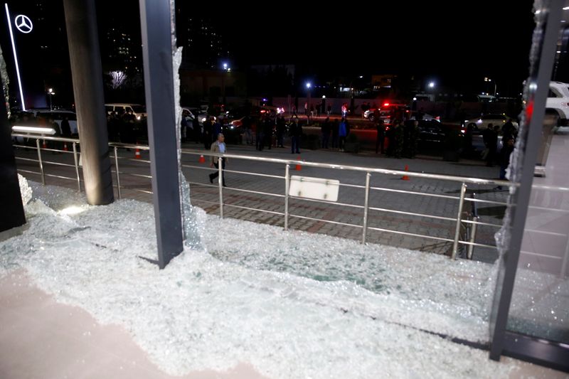 &copy; Reuters. FILE PHOTO: Broken glass is seen at the Bright Castle Motors building after reports of mortar shells landing near Erbil airport