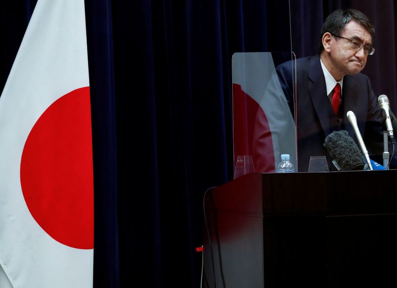 &copy; Reuters. FILE PHOTO: Japanese minister in charge of vaccine roll-out holds news conference on preparations, in Tokyo