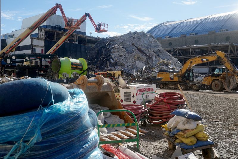 &copy; Reuters. Machinery is parked ready to work on  the debris pile for the Trump Plaza Casino that was demolished in Atlantic City