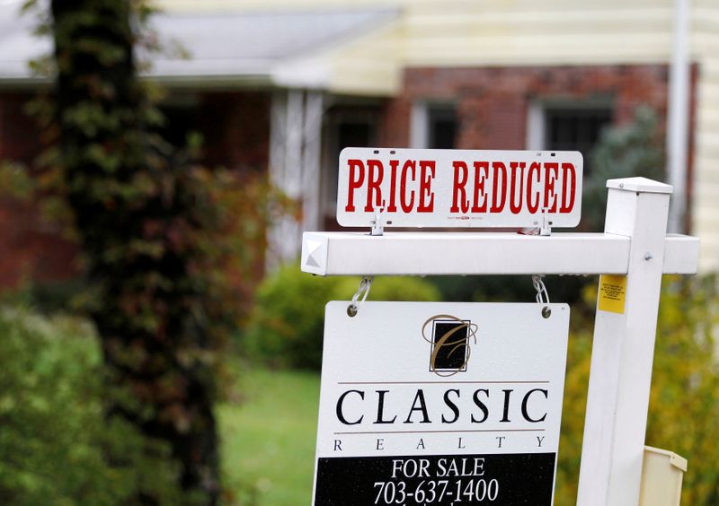 &copy; Reuters. FILE PHOTO: A &quot;Price Reduced&quot; sign is displayed on a home for sale in northern Virginia suburb of Vienna