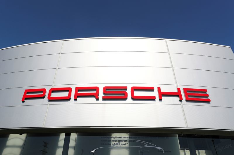 © Reuters. FILE PHOTO: A logo of Porsche is seen outside a Porsche car dealer, amid the coronavirus disease (COVID-19) outbreak in Brussels