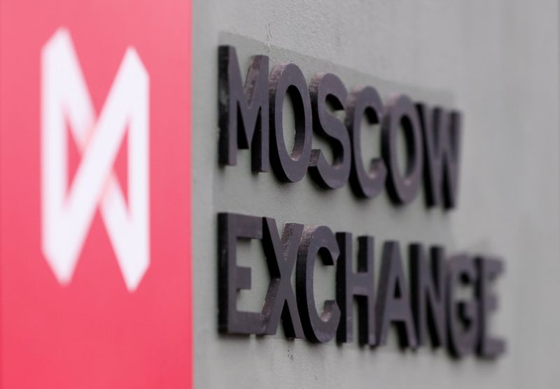 &copy; Reuters. FILE PHOTO: A board with the logo of the Moscow Exchange is on display in its office in Moscow