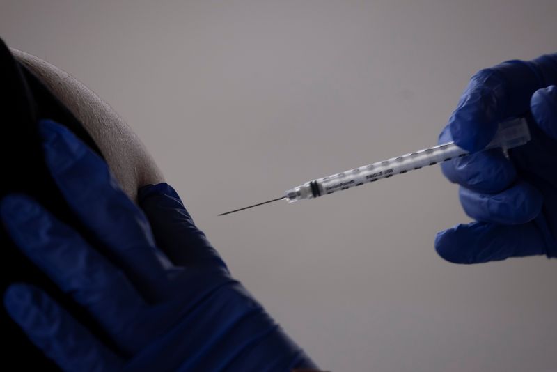 &copy; Reuters. Farmworkers are vaccinated for the coronavirus disease (COVID-19) in California