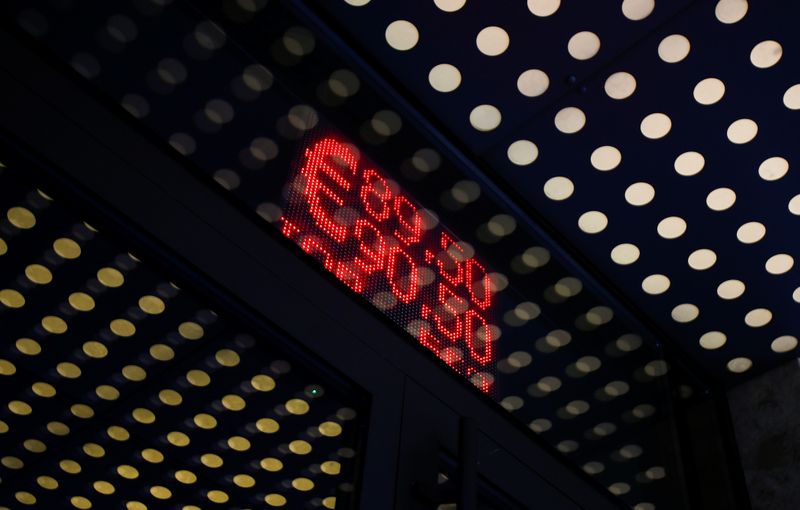 &copy; Reuters. A board showing currency exchange rates of the euro against the Russian rouble is on display in Moscow