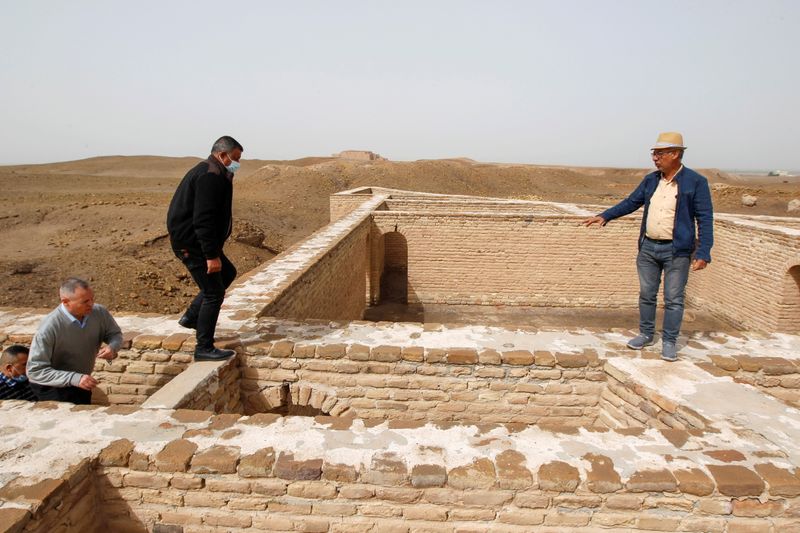 &copy; Reuters. Officials inspect the ancient archeological site of Ur, traditionally believed to be the birthplace of Abraham, ahead of the planned visit of Pope Francis, in Ur near Nassiriya