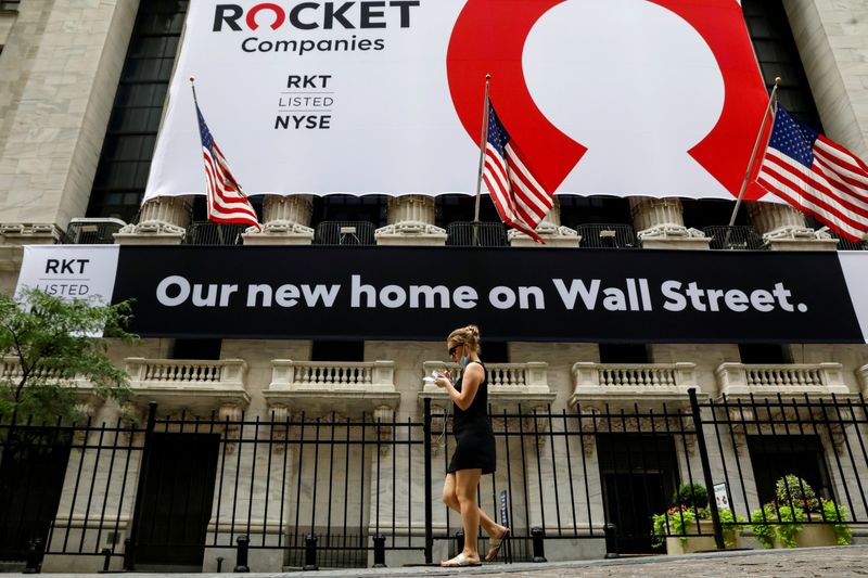&copy; Reuters. FILE PHOTO: A banner celebrating Rocket Companies Inc. IPO is seen on the front facade of the NYSE in New York