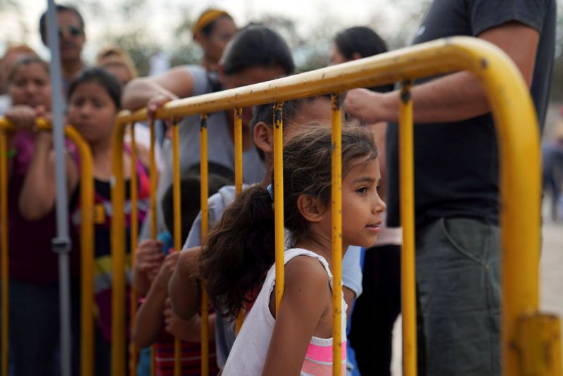 Delays rattle asylum seekers waiting in Mexico as hopes of quick U.S. entry fade