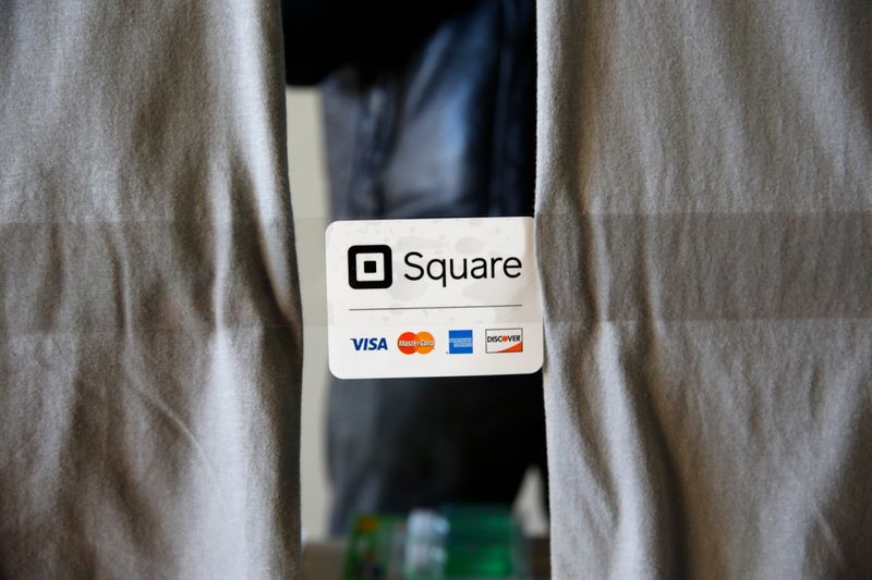 &copy; Reuters. An advertisement for the Square payment processor is seen outside a vendors site along the High Line in New York