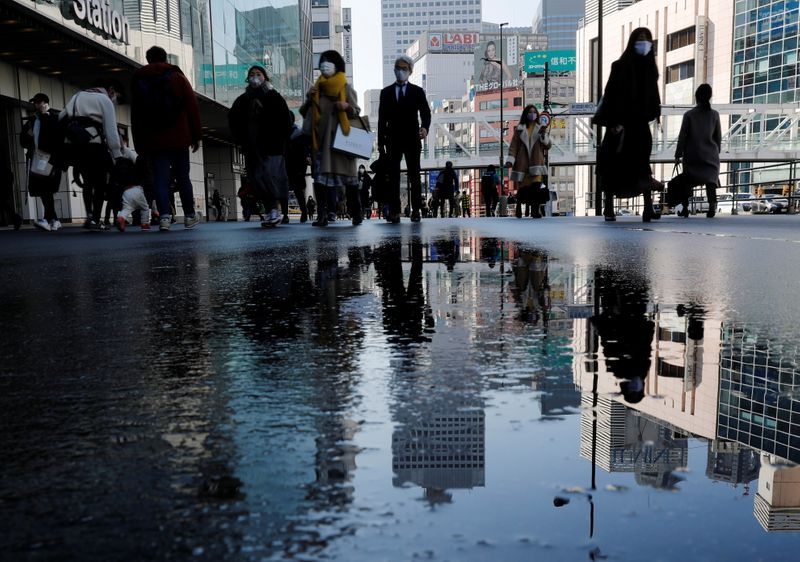 Japan regions push to end state of emergency as COVID-19 cases fall
