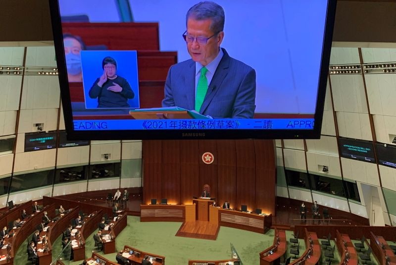 © Reuters. Hong Kong's Finance Secretary Paul Chan delivers the annual budget address at the Legislative Council in Hong Kong