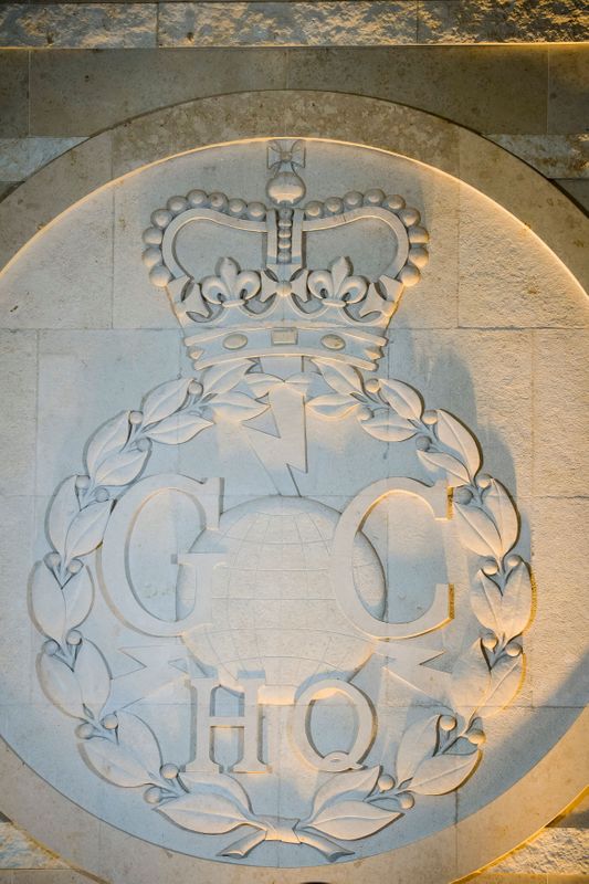 &copy; Reuters. FILE PHOTO: A GCHQ logo on a wall inside Britain&apos;s Government Communication Headquarters, in Cheltenham