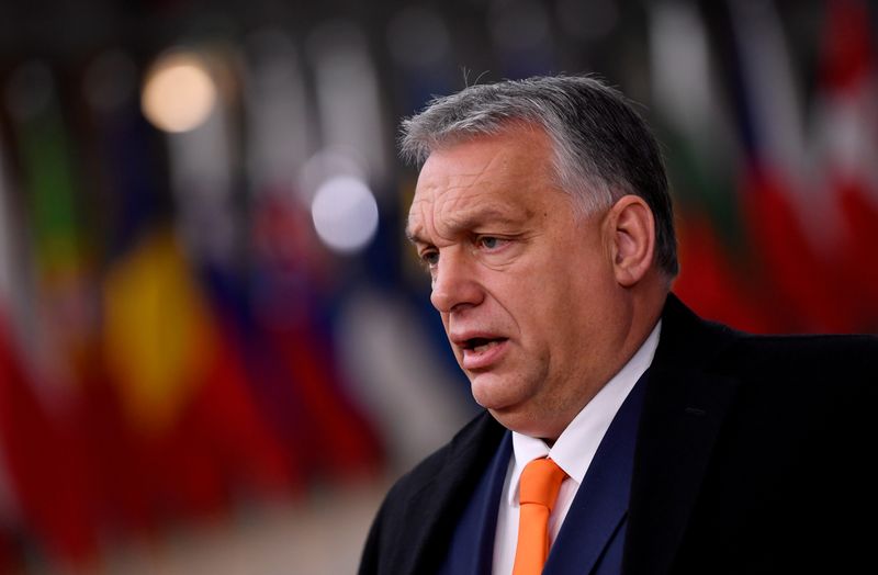 &copy; Reuters. FILE PHOTO: Hungary&apos;s Prime Minister Viktor Orban speaks on arrival for an EU summit in Brussels