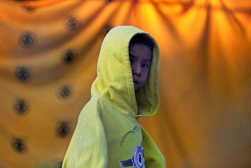 &copy; Reuters. FILE PHOTO: A migrant child who is seeking asylum in the U.S. is pictured at a migrant encampment in Matamoros