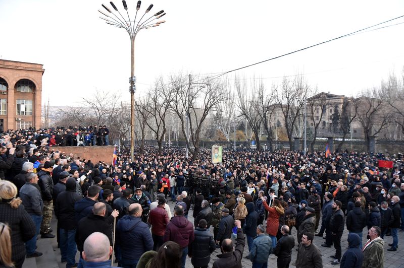 &copy; Reuters. FILE PHOTO: People attend an opposition rally in Yerevan