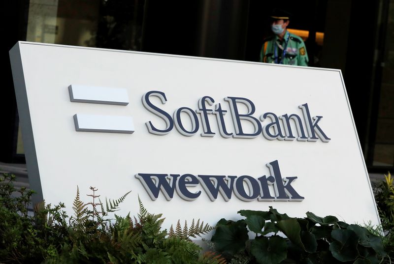 &copy; Reuters. The logos of SoftBank and WeWork are displayed in front of SoftBank&apos;s new headquarters building in Tokyo