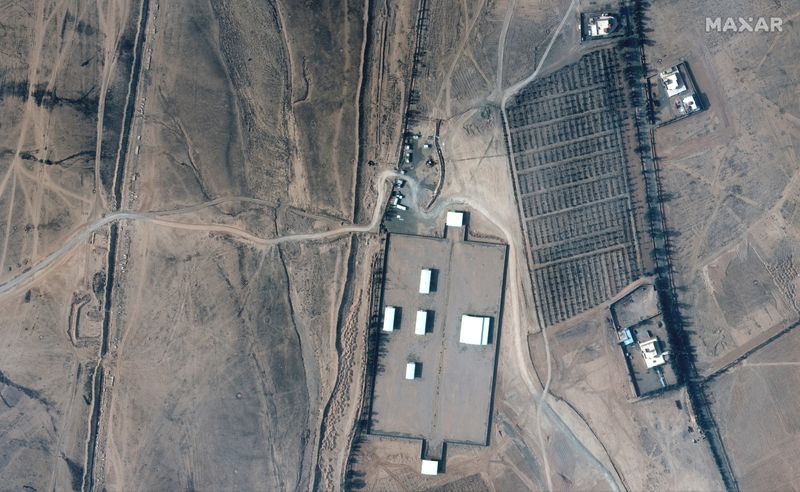&copy; Reuters. A closer view of an Iraq-Syria border crossing and buildings before airstrikes, seen in this February 3, 2021 handout satellite image provided by Maxar