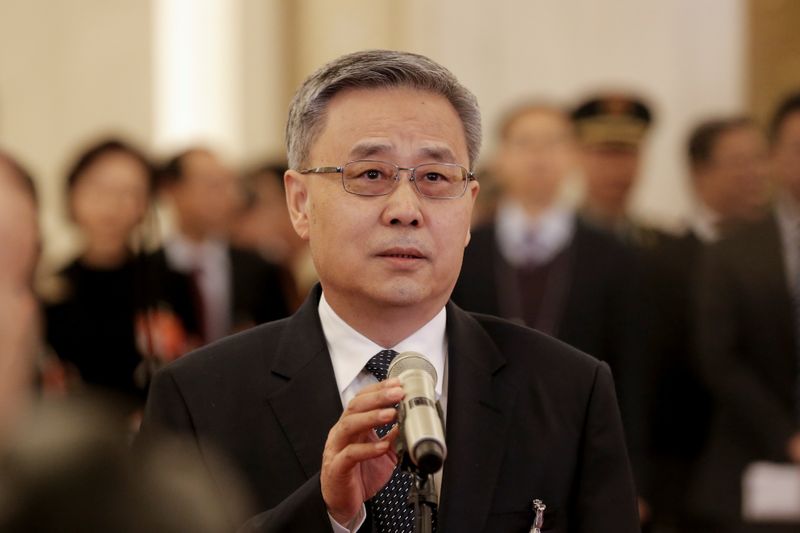 &copy; Reuters. China&apos;s top banking regulator Guo Shuqing speaks to reporters on the sidelines of the National People&apos;s Congress (NPC) at the Great Hall of the People in Beijing