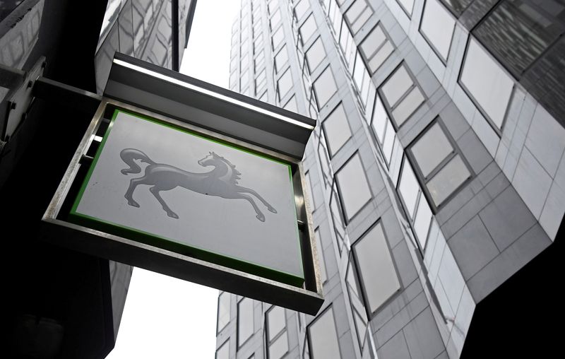 &copy; Reuters. FILE PHOTO: A sign hangs outside a Lloyds Bank branch in London, Britain