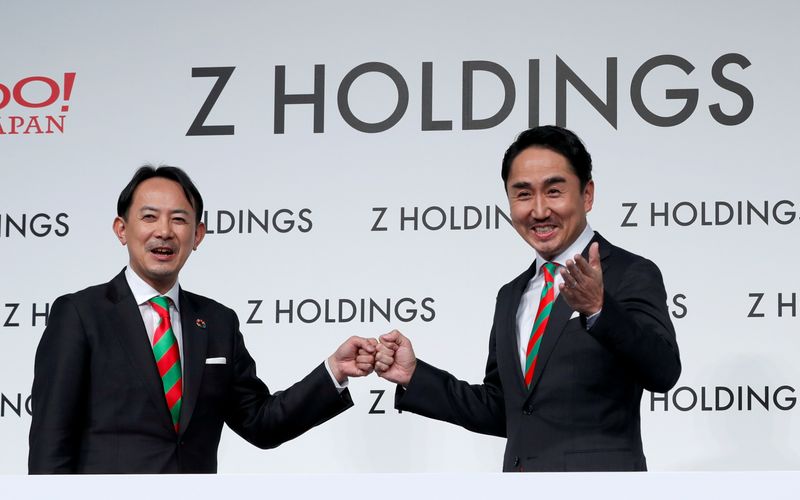 &copy; Reuters. FILE PHOTO: Co-CEOs of Z Holdings Kawabe and Idezawa hold a news conference in Tokyo
