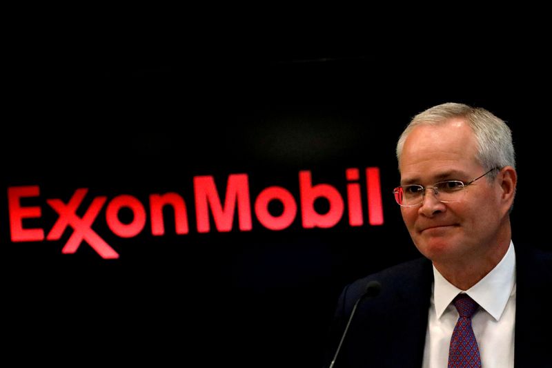 © Reuters. FILE PHOTO: Darren Woods, Chairman & CEO, Exxon Mobil Corporation attends a news conference at the NYSE