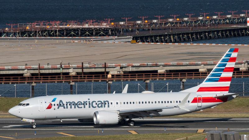 © Reuters. FILE PHOTO: First U.S. commercial flight of a Boeing 737 MAX, since regulators lifted a 20-month grounding in November, lands in New York