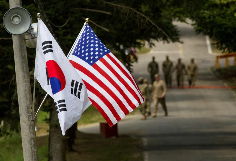 &copy; Reuters. FILE PHOTO: American and South Korean flags at Yongin South Korea