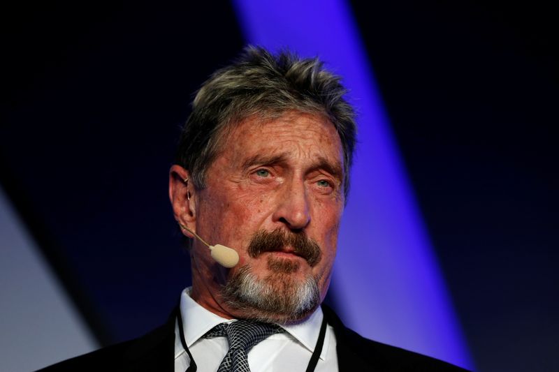 &copy; Reuters. John McAfee, co-founder of McAfee Crypto Team and CEO of Luxcore and founder of McAfee Antivirus, speaks at the Malta Blockchain Summit in St Julian&apos;s