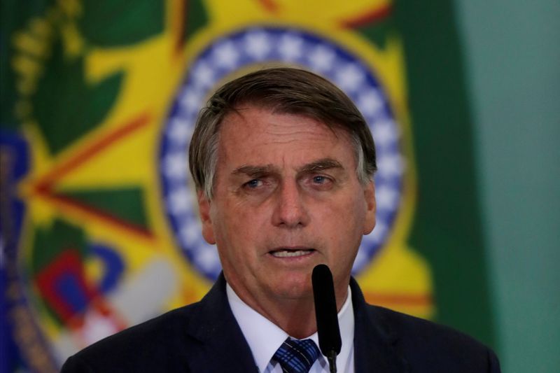 &copy; Reuters. FILE PHOTO: Brazil&apos;s President Jair Bolsonaro speaks during a ceremony to launch a program to help new mayors, at Planalto Palace in Brasilia