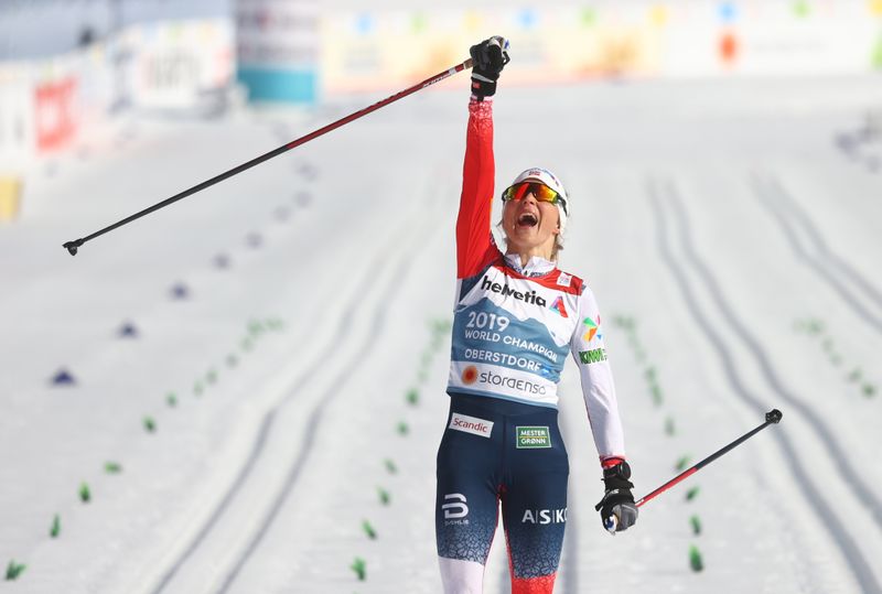 Nordic skiing: Blistering Johaug signs off with 30km gold