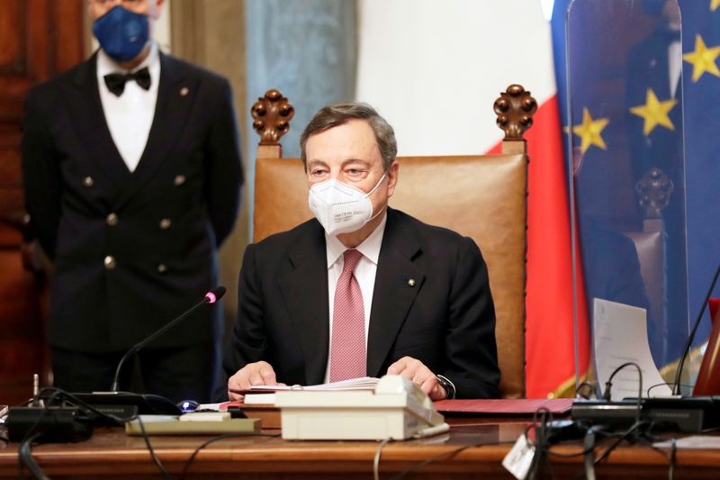 © Reuters. FILE PHOTO: Prime Minister designate Draghi and his new government are sworn-in, in Rome