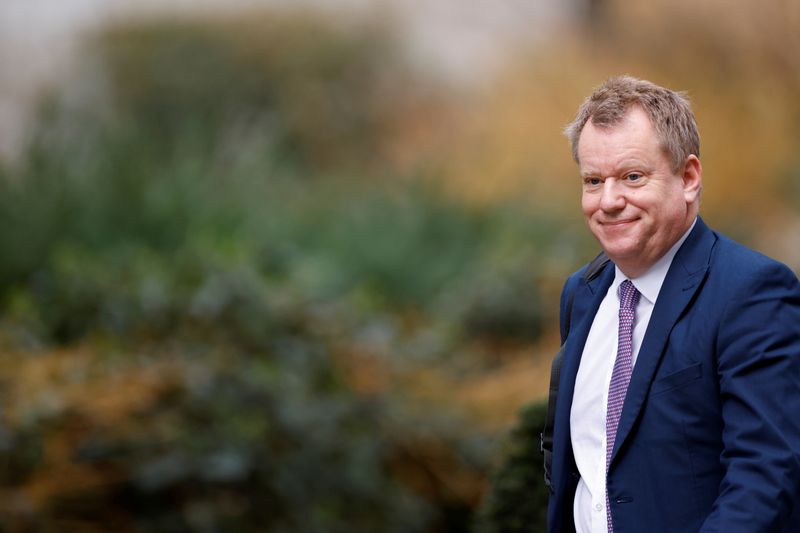 &copy; Reuters. FILE PHOTO: David Frost walks outside Downing Street in London