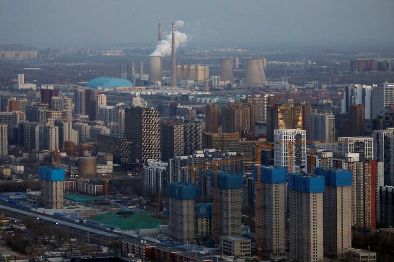 &copy; Reuters. FILE PHOTO: Residential buildings under construction are seen near the central business district (CBD) in Beijing