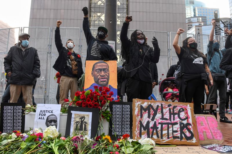 &copy; Reuters. Protesters march through downtown Minneapolis during the &quot;I Can&apos;t Breathe&quot; Silent March for Justice the day before Derek Chauvin&apos;s trial