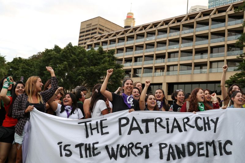 &copy; Reuters. People participate in a rally for International Women&apos;s Day in Sydney
