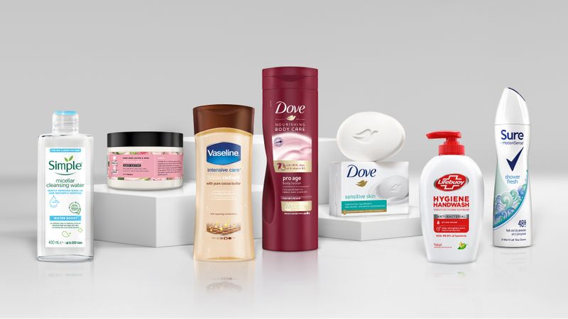 &copy; Reuters. A 2021 handout illustration shows Unilever beauty products without the word &apos;normal&apos; on its product packaging