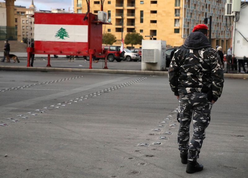 &copy; Reuters. A Lebanese police walks in Beirut