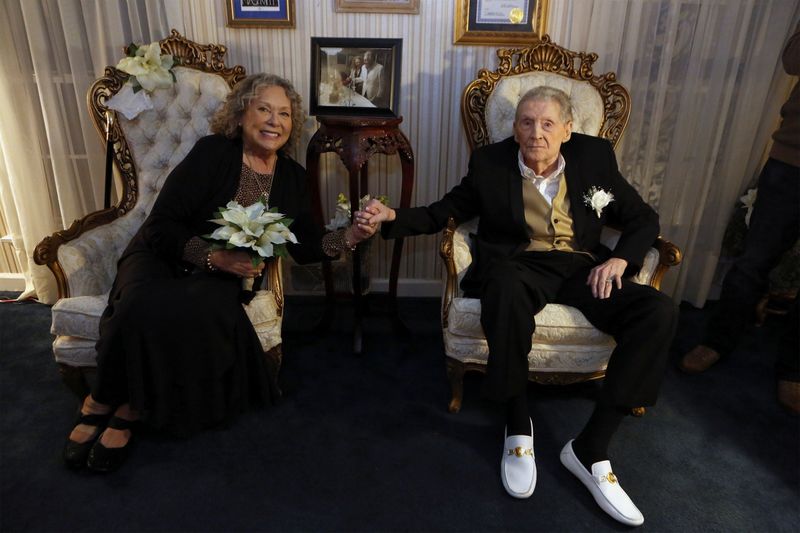 &copy; Reuters. A vaccinated 85-year-old Jerry Lee Lewis renews marriage vows with 7th wife Judith at his ranch in Nesbit