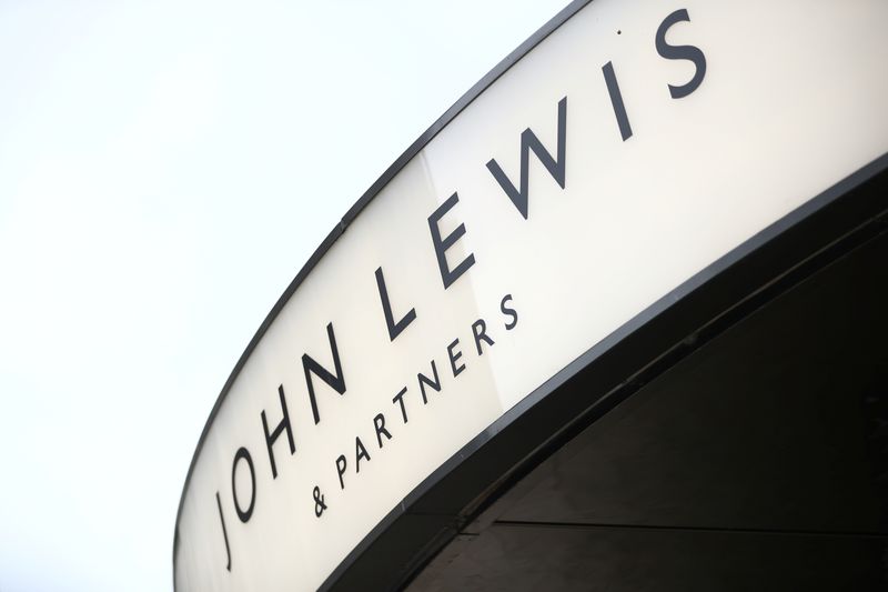 &copy; Reuters. Signage is displayed outside a John Lewis &amp; Partners store at the Oxford Street, in London