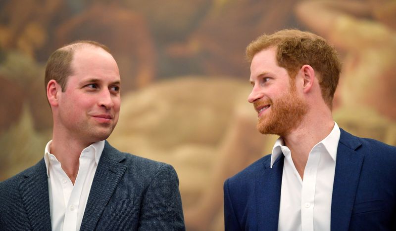 © Reuters. FILE PHOTO: Britain's Prince William and Prince Harry attend the opening of the Greenhouse Sports Centre in central London
