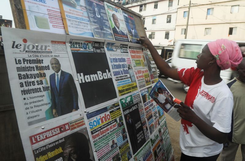 &copy; Reuters. Ivorians react to death of prime minister Bakayoko, in Abidjan