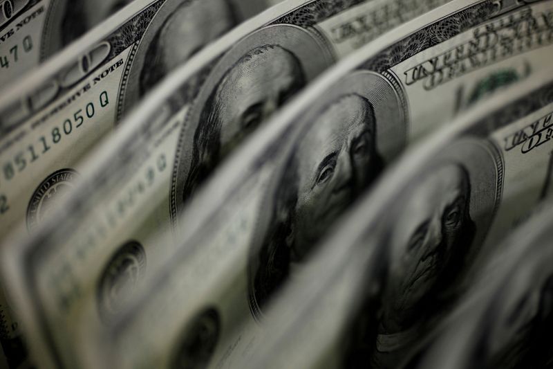 Dollar steadies from one-week lows as bond yields tick up