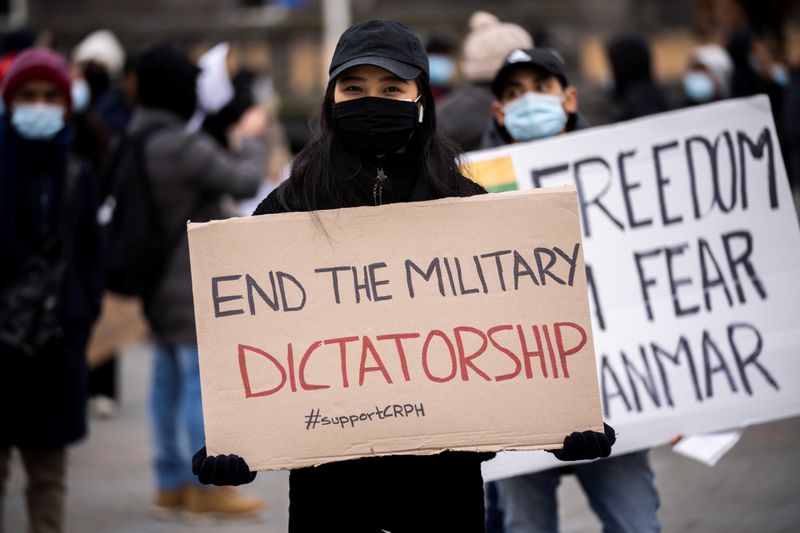 &copy; Reuters. People attend a protest against the military coup in Myanmar, at Town Hall Square in Copenhagen