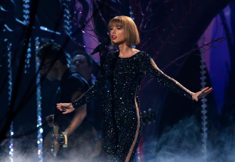 &copy; Reuters. Taylor Swift performs &quot;Out of the Woods&quot; at the 58th Grammy Awards in Los Angeles