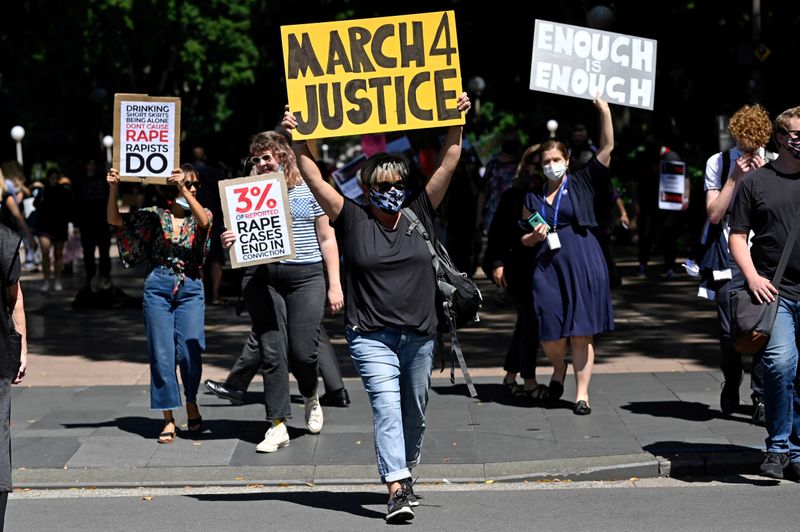 © Reuters. FILE PHOTO: Protesters rally following sexual assault allegations in Australian government in Sydney