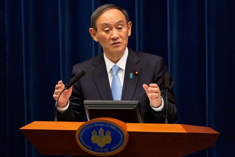 &copy; Reuters. FILE PHOTO: Japanese PM Suga holds news conference in Tokyo on March 5, 2021