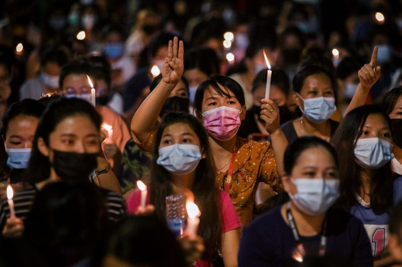 &copy; Reuters. Anti-coup night protest in Yangon