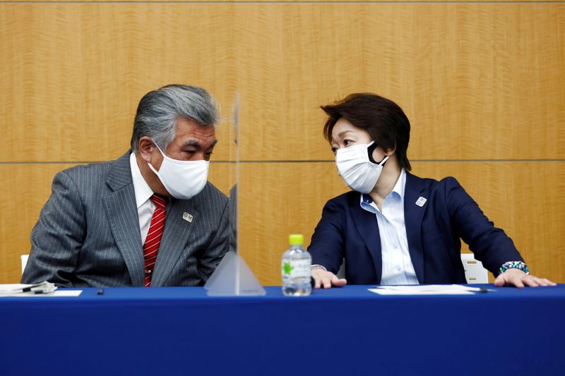 &copy; Reuters. Tokyo 2020 Olympics Organising Committee President Seiko Hashimoto and Vice Director General Yukihiko Nunomura attend press briefing on Tokyo 2020 Olympic Torch Relay