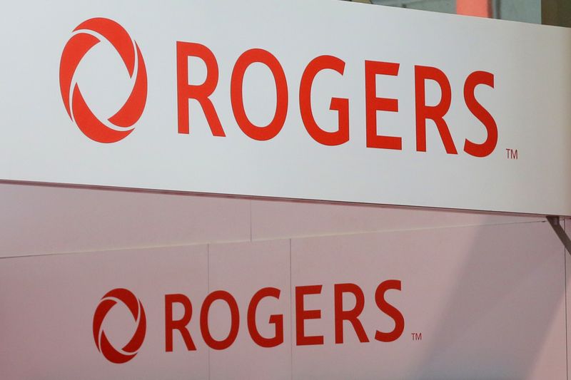 &copy; Reuters. FILE PHOTO: Rogers Communications logos are seen above a booth at the Canadian International AutoShow in Toronto