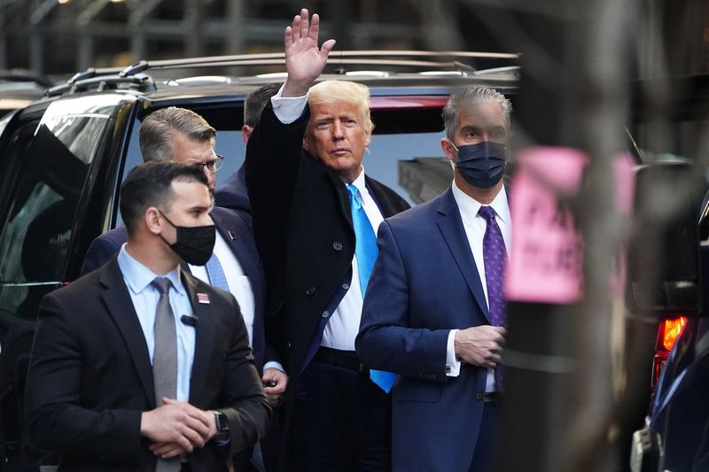 &copy; Reuters. Trump acknowledges people as he gets in his SUV outside Trump Tower in New York City