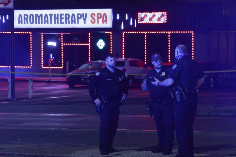 © Reuters. City of Atlanta police officers are seen outside of Gold Spa after deadly shootings in the Atlanta area